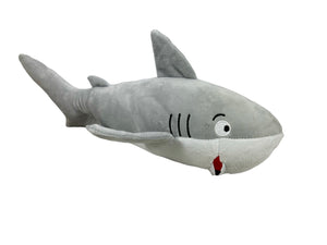 Plush dog toy designed to look like a shark.