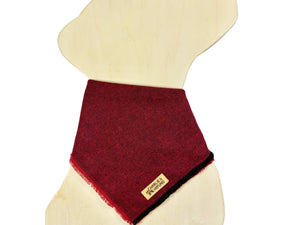 Marroon and black flannel bandana on a dog-shaped wooden cutout. Feature brand label ' Charlie & the Hound'.