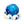 Plush blue tie-dyed octopus dog toy with white accents and a smiling face on a white background.