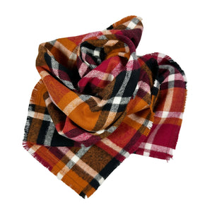 Plaid bandana featuring colors including black, orange, maroon, and white.