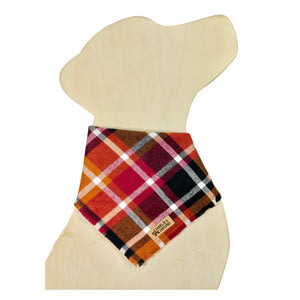Plaid bandana on a dog-shaped wooden block with 'Charlie & the Hound' branding.