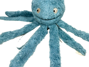 A blue plush dog toy resembling an octopus with a smiling face, made from soft and natural materials.