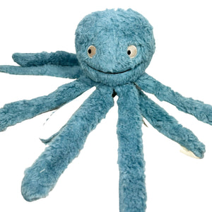A blue plush dog toy resembling an octopus with a smiling face, made from soft and natural materials.